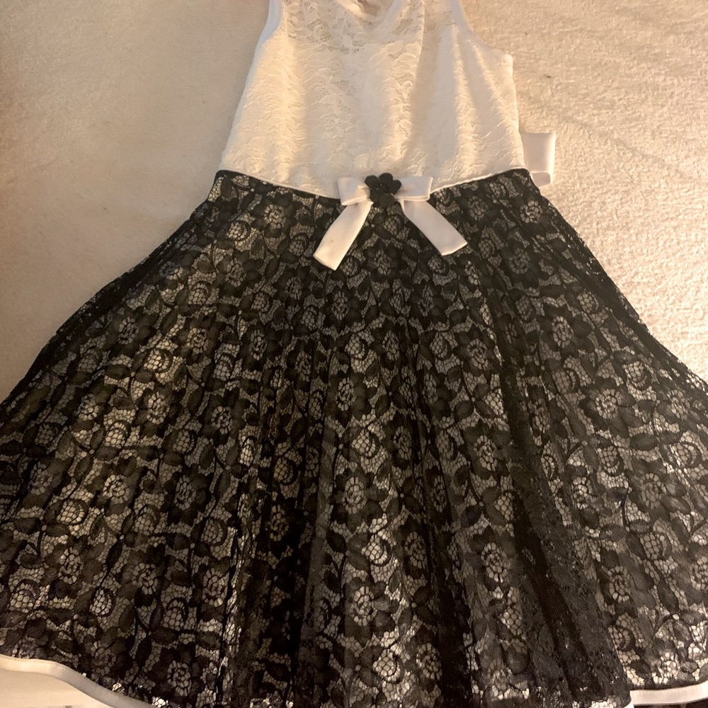 Girls size 8, black and white, lace dress.
